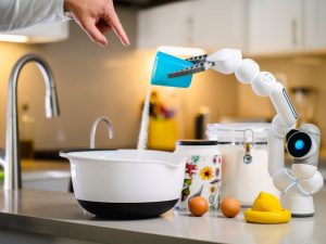 a robot pours a cup of flour into a bowl