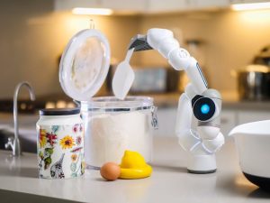 a robot scoops flour from a container